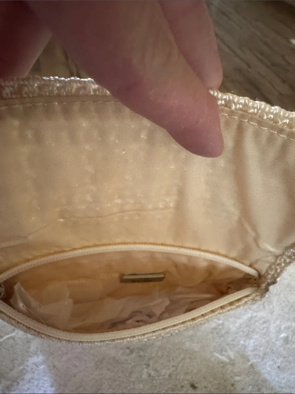 NWOT, The Sak crochet zip pouch in creme .